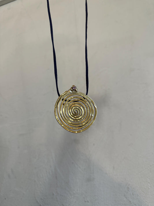 Spiral Pendant Necklace: A Sculptural Brass Piece with Zircon Detail