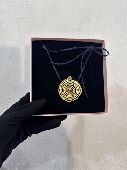 Spiral Pendant Necklace: A Sculptural Brass Piece with Zircon Detail